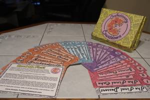 Confectionary Countdown box beside a set of 30 fanned out cards with dessert names.