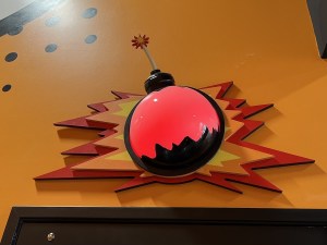 Red illuminated bomb indicates that the game is occupied.