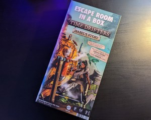 Box art for Time Drifters, Isabel' Story, depicts a woman working on a the exterior of a steam punk-ish time machine.