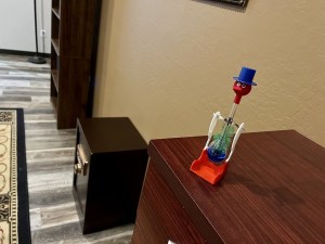 One of those old toy bird things with liquid in them that swing like a pendulum.