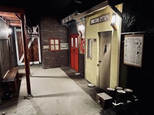 An old west town at night.