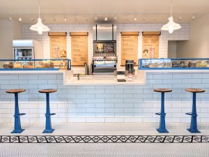 Soda Jerk counter with 4 stools and an elegant, clean aesthetic.