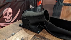 Closeup of a small 3D printed cannon.