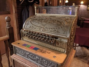 An ornate old cash register.