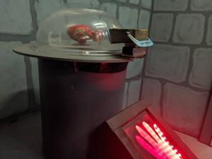 A strange creature in a device.