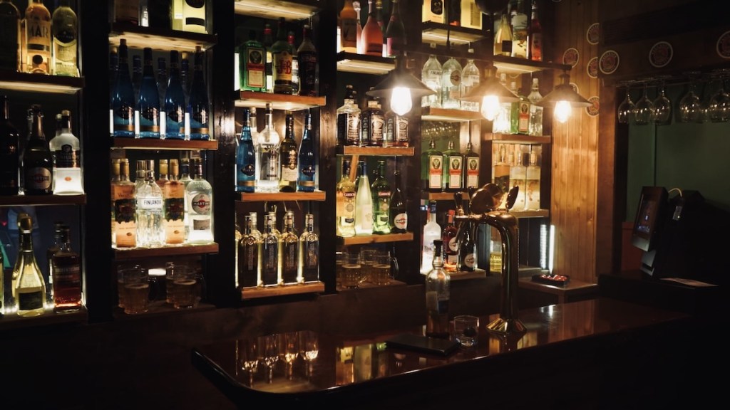 A very well stoked, dramatically lit bar.