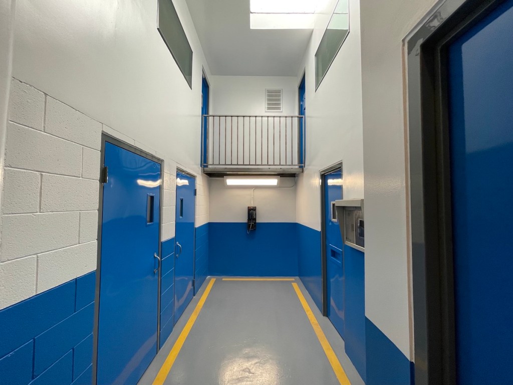 A hallway in a prison.