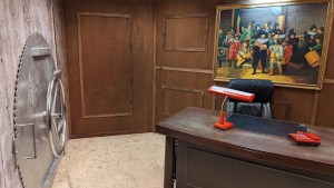 A large vault door in a bank.