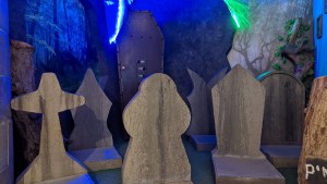 A cemetery with many headstones.