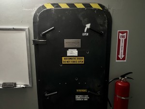 A big metal, militaristic-looking door.