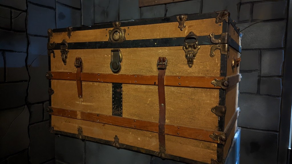 A large, old wooden trunk.