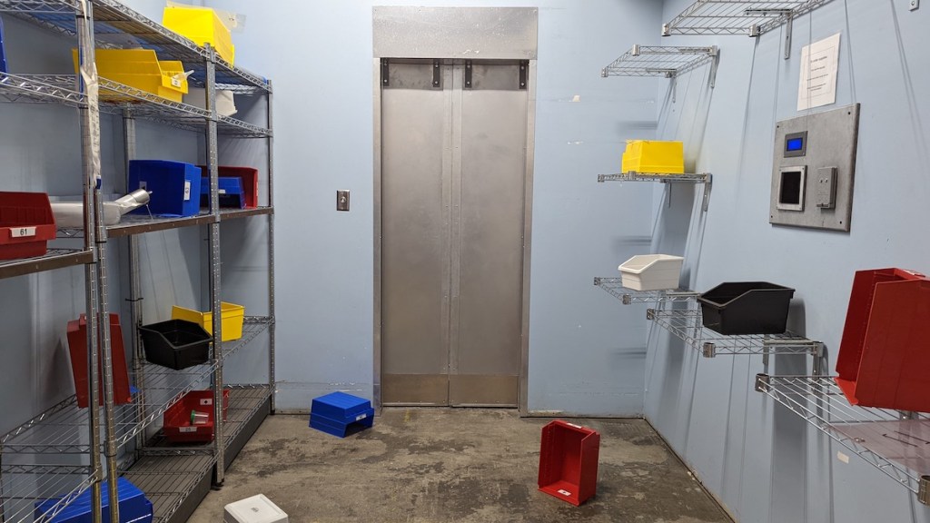 A mess hospital lap, with containers turned over all over the room.