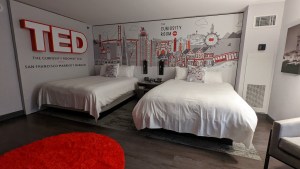 A red and white, TED themed hotel room.
