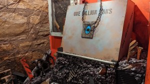 A large box labeled "One Million Tons" atop rubble.