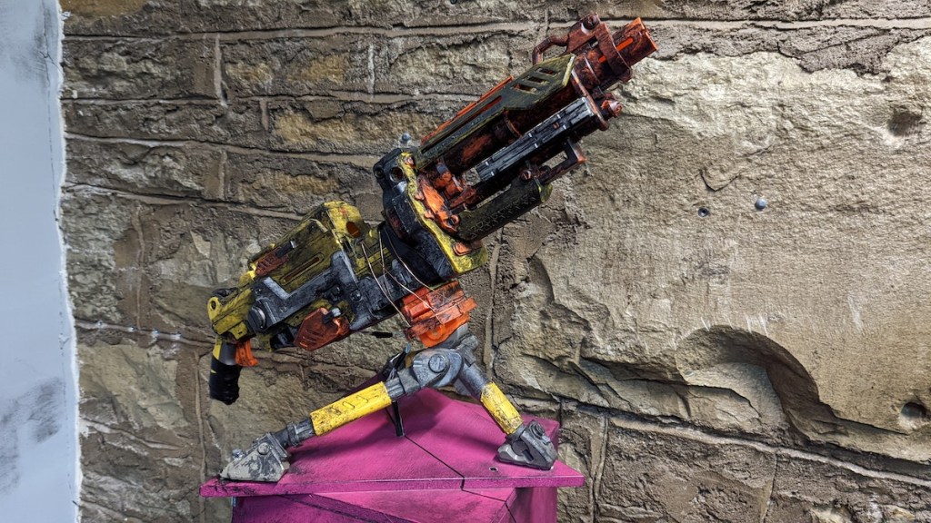 An elaborately painted Nerf gun.