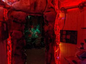 A hut with a passage into a temple.