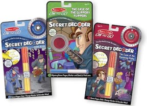 3 Secret Decoder book series, each with a colorful comic-bookish cover and special market that reveals secrets.