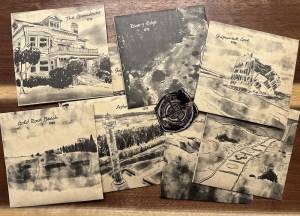 An assortment of envelopes with black & white prints of different locations from the Goonies.