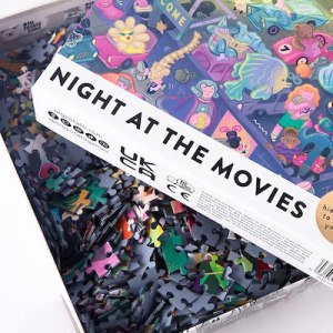 Colorful Night At The Movies jigsaw puzzle, the box is partially open.