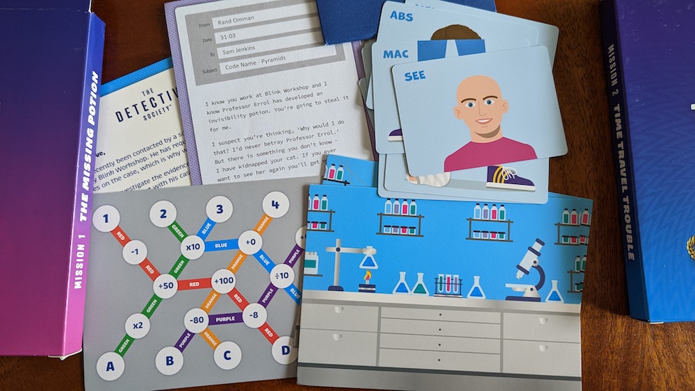 An assortment of colorful paper puzzle components for a lab-themed puzzle.