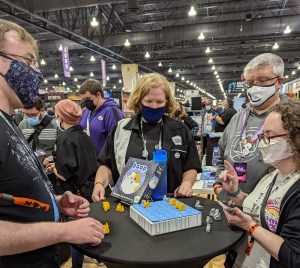 Players learning to play the cat themed game, "boop."