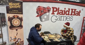 People playing Hickory Dickory at the PlaidHat Games booth.