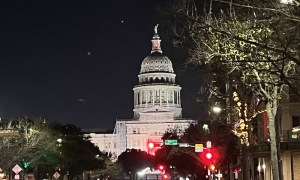 The Texas Capitol building at night.