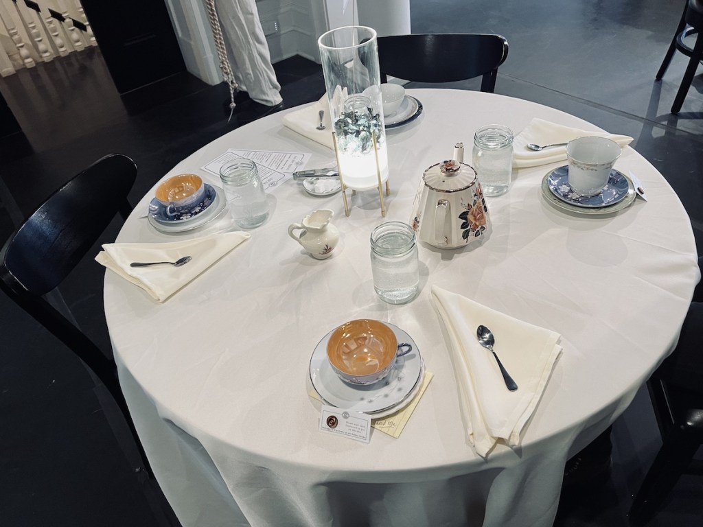 A tea time table beautifully set for 4 people.