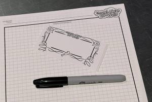 Imagineer-do-wells name tag and pitch sheet.