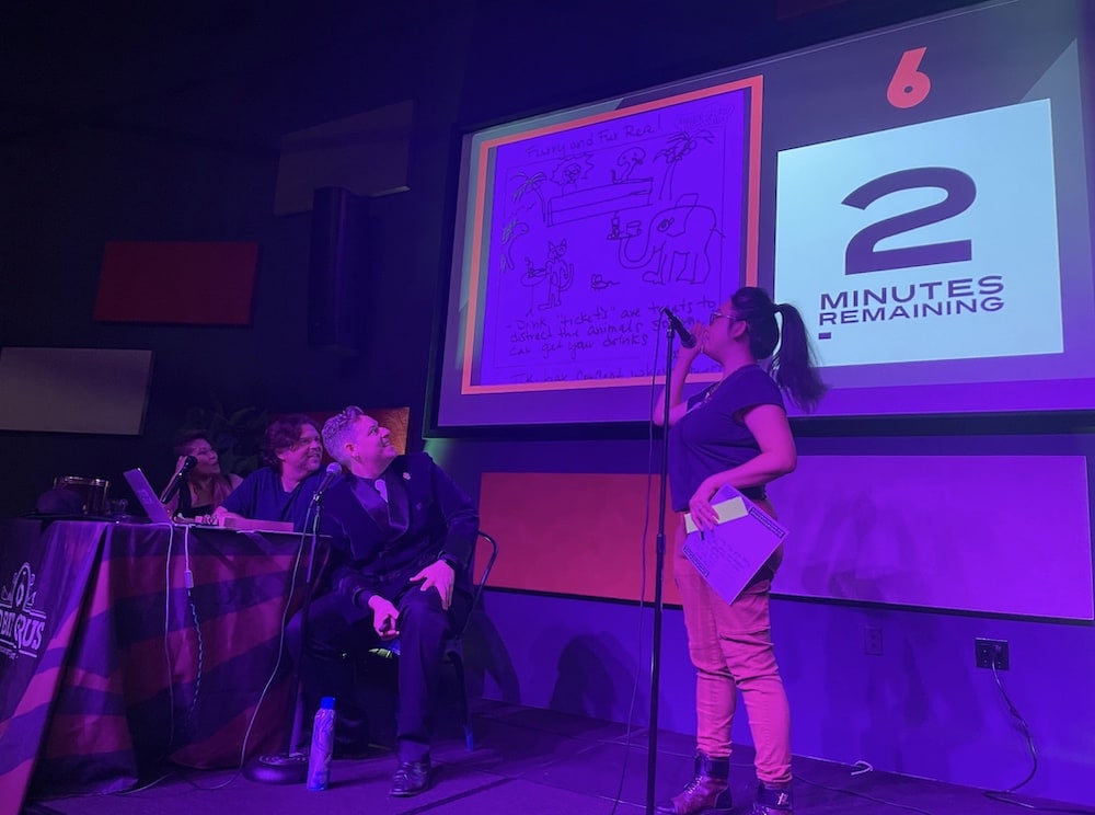 Peih-Gee on stage pictching her concept for "Furry and Fur Real."