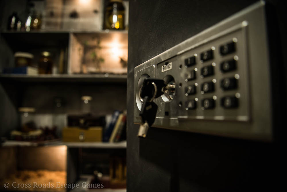 Closeup of a safe with a key in it.