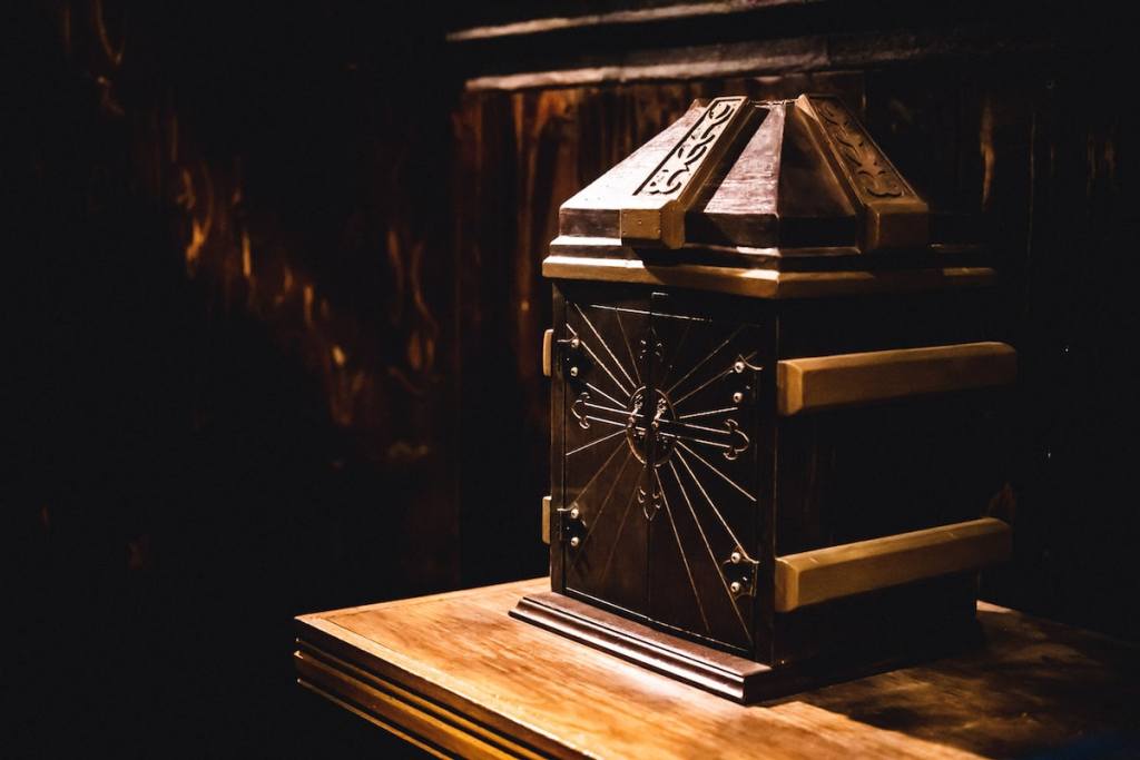 An elaborate wooden box on display.