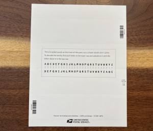 Back of the Women Cryptologists of WWII stamp book features an explanation of substitution ciphers and the correct substitutions.