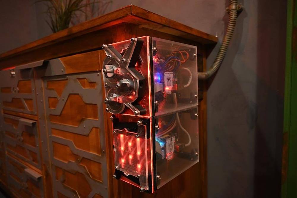 A large, unusual mechanism set inside of a table.