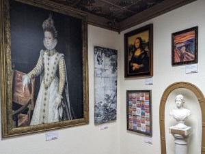 Art museum with an assortment of paintings and sculptures.