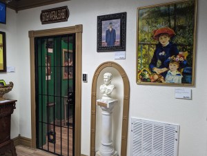 Art museum with an assortment of paintings and sculptures.