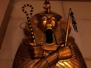 Closeup of the face of an Egyptian sarcophagus.