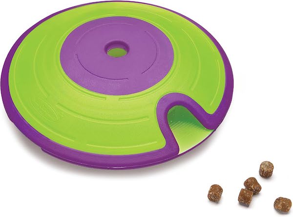 Green and purple disc with an exit point for treats.