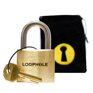 A brass puzzle lock with its key attached to its shackle. The look reads, "LOOPHOLE"