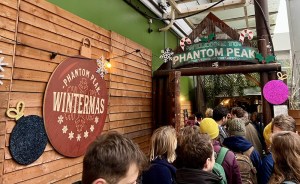 The line to enter Phantom Peak. It is packed with people.