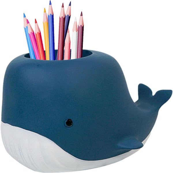 A whale cup filled with colored pencils.