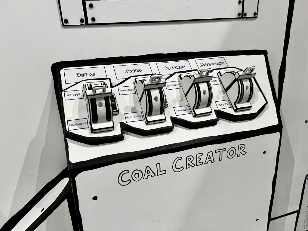 The "Coal Creator" has 4 big switches, "deeds," "speed," "success," and "mountain."