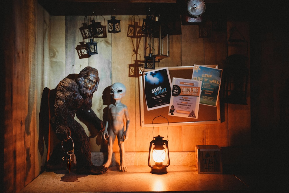 Statues of Bigfoot and an alien.