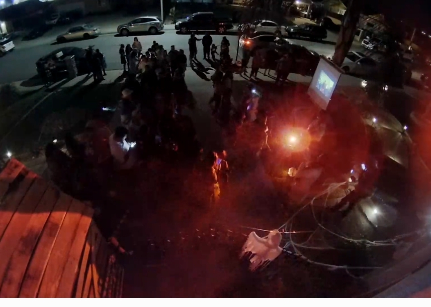 outside photo of crowd gathered at home haunt