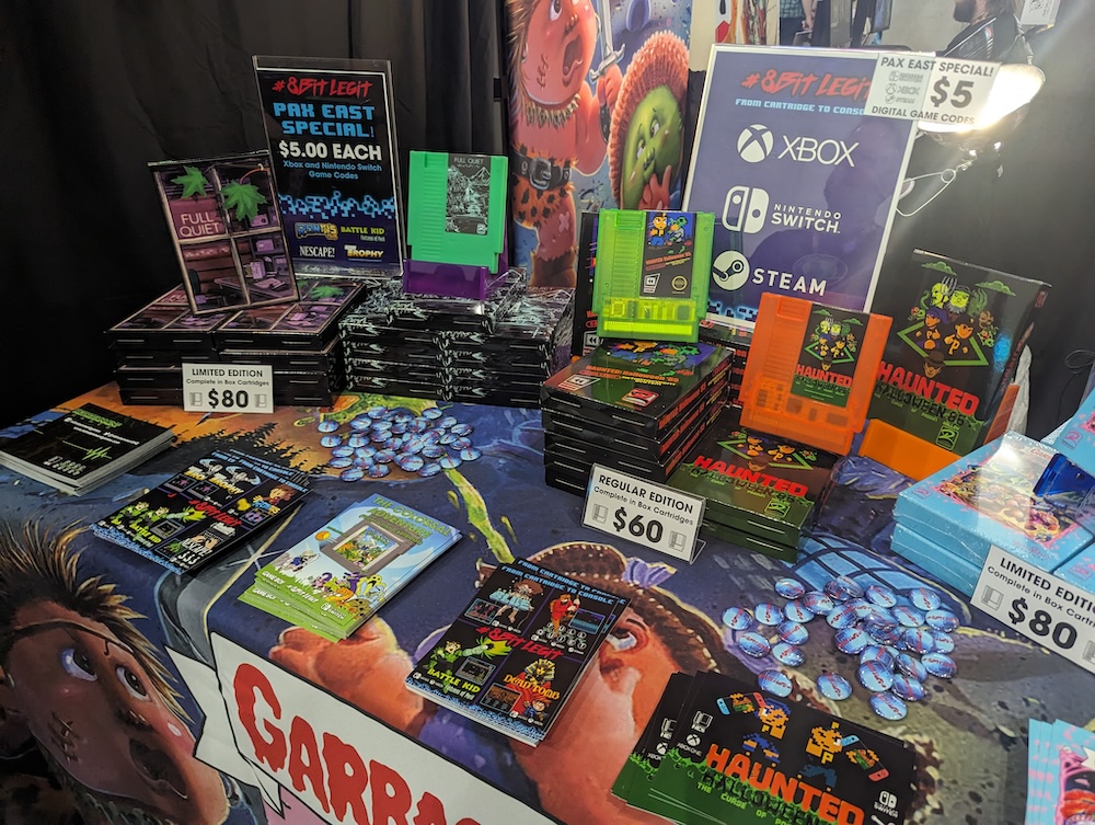 8 Bit Legit booth selling modern NES cartridge games.