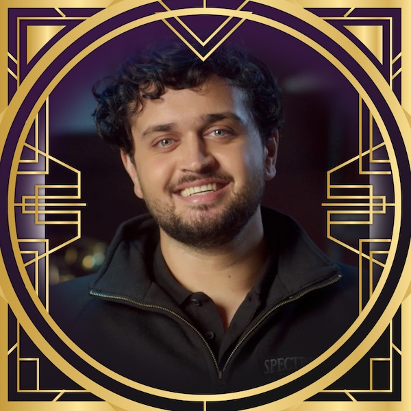 RECON speaker, Nick Moran's headshot in a gold, art deco frame with the RECON logo.