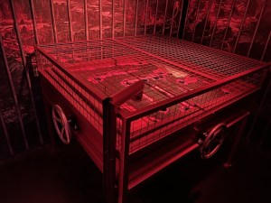 A large metal maze contraption.