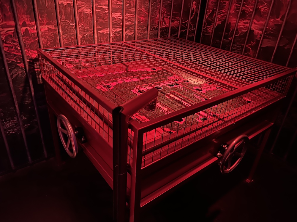 A large metal maze contraption.