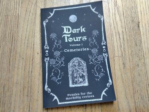 Dark Tours Volume 1 Cemeteries book cover featuring macabre skeletal art.