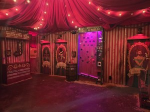 Inside of a freakshow's circus tent.